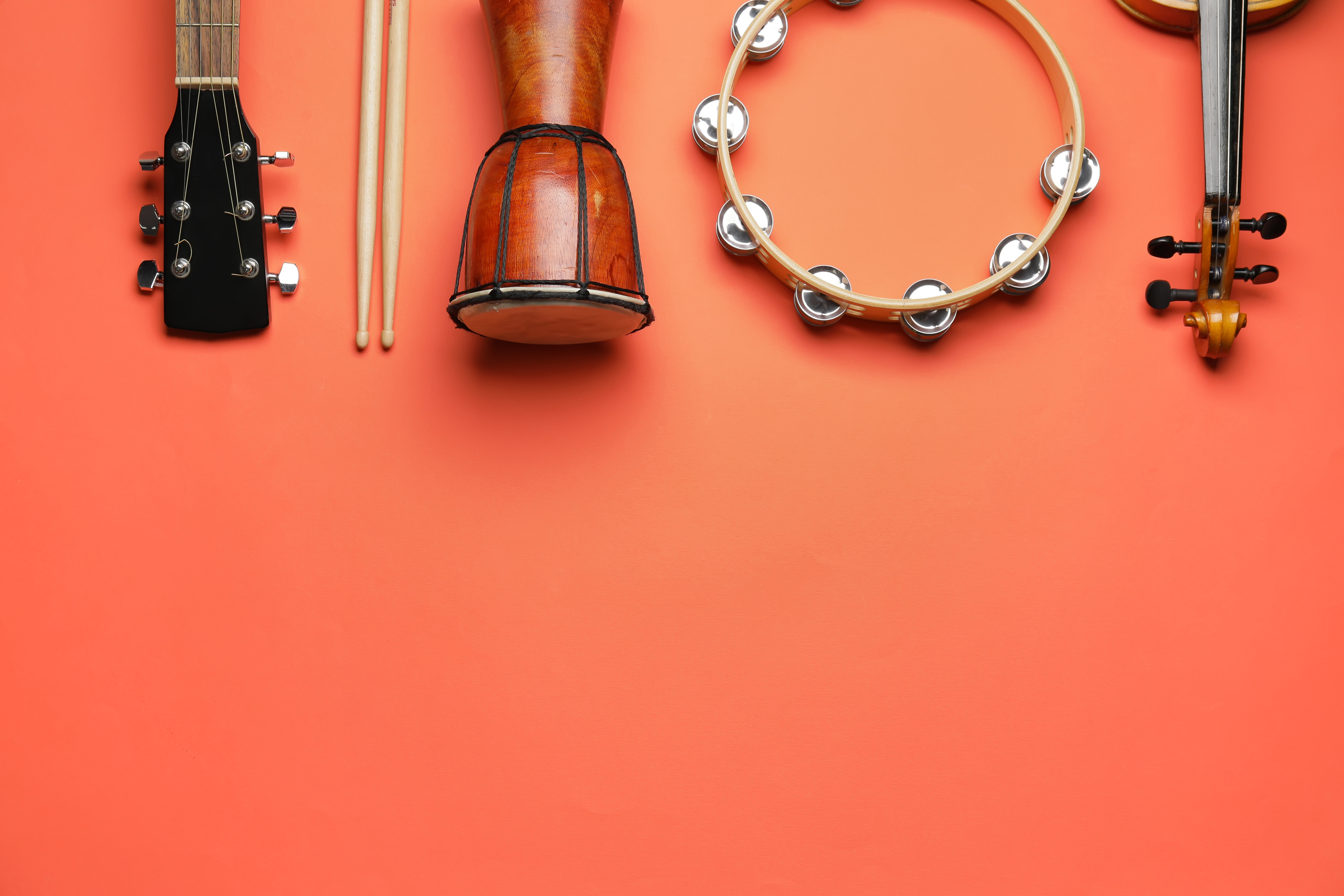 Different Musical Instruments on Color Background