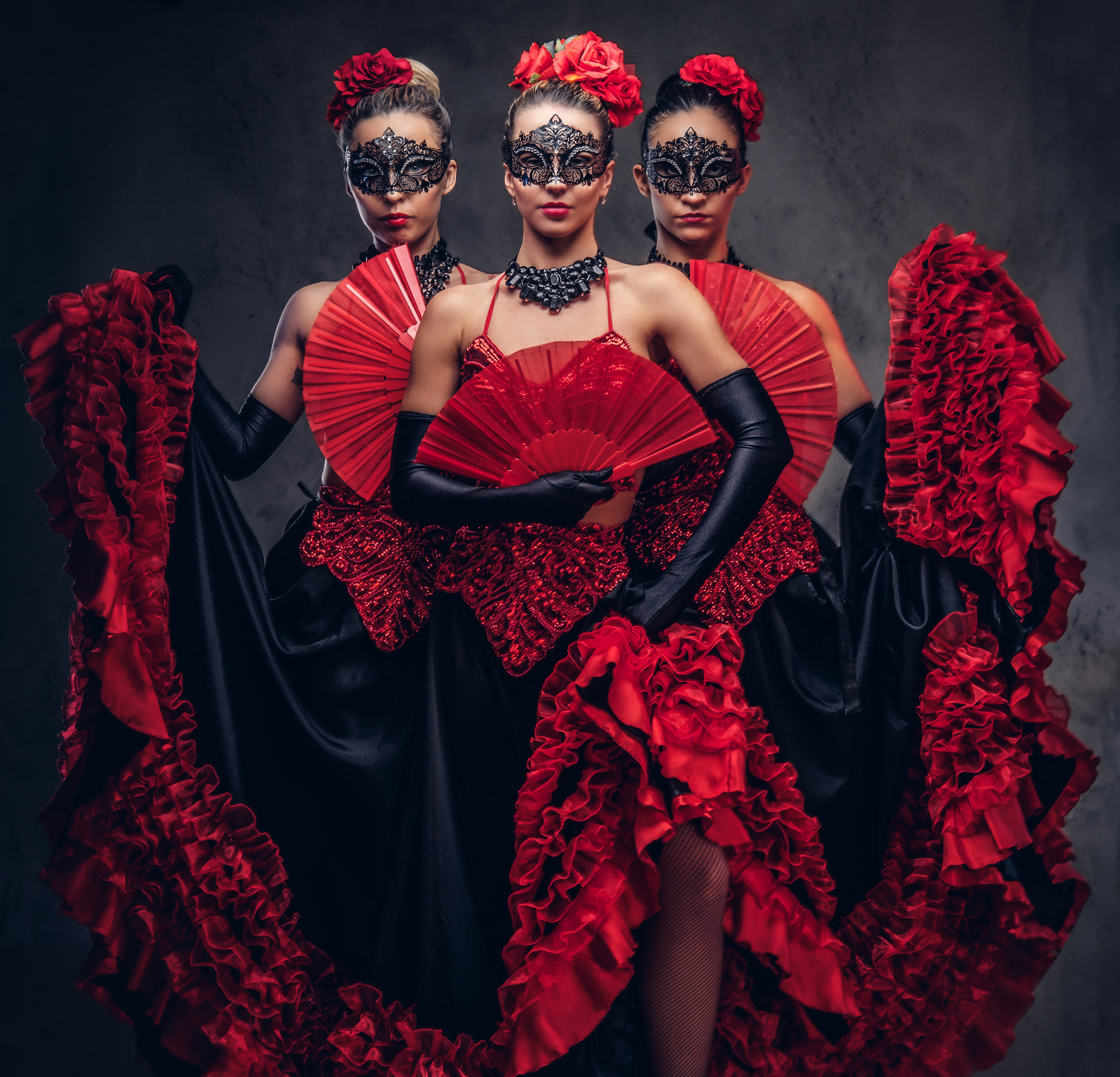 Flamenco Spanish Seductive Dancers Wearing Traditional Costume.